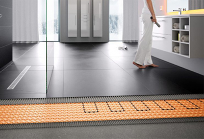 Installation de plancher chauffant performant - Pour la construction des planchers chauffants nous utilisons la membrane Ditra Heat et le système Schluter de haute performance. Travaux d'installation de plancher chauffant effectués à Chambly sur la rive-sud de Montréal.